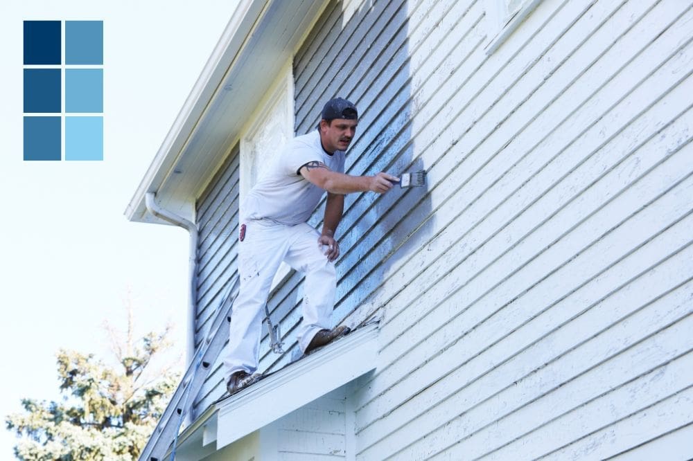 a man painting the exterior